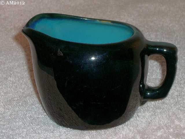 Plainsman 5A creamer, black and turquoise glaze